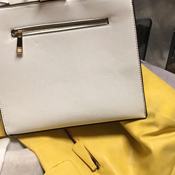 The non leather Acilla by Aldo is in like new condition.  Stores in 5/areas. - Picture 4 of 5